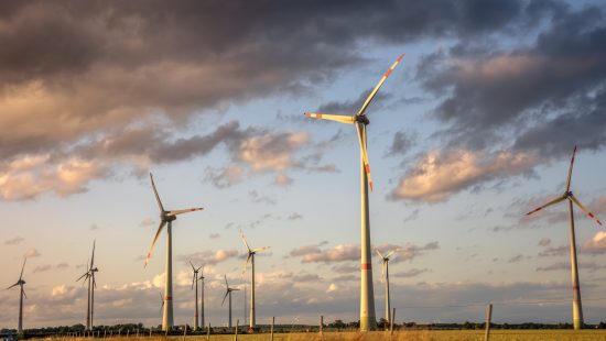 wind-turbines-renewable-energy-dramatic-sky-min